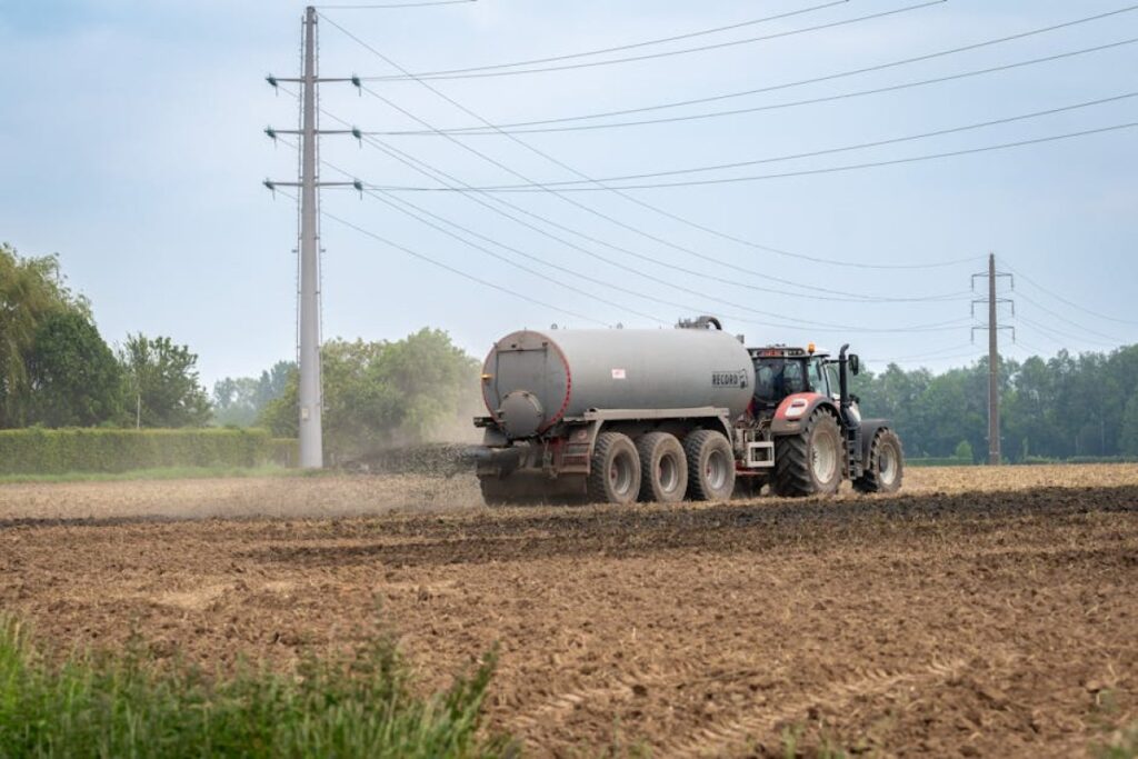 tractor spreading manure