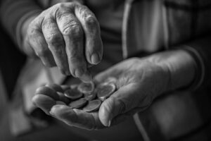 elderly person with money
