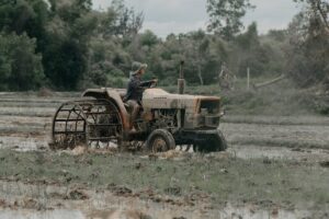 farmer tractor field